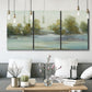 Three-panel canvas wall art featuring calming scenic landscape view, displayed in a modern living room above seating.
