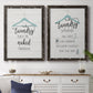 Set of two black barnwood framed canvas prints depicting a coordinated art pair of humorous laundry-room sayings and clothing icons rendered as rustic typographic wall art above a dining room sideboard.