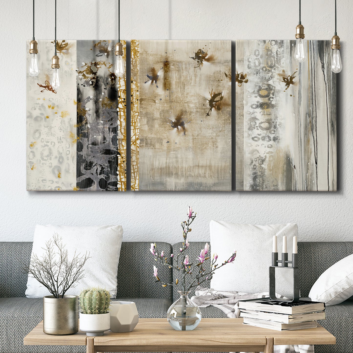 Three-panel canvas wall art featuring abstract willow inspired vertical forms, displayed in a modern living room above seating.