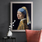 Iconic portrait of a girl wearing a pearl earring by Johannes Vermeer in an ornate weathered white frame displayed in a dark-toned interior setting.