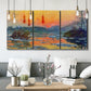 Three-panel canvas wall art featuring winter sunset over river, displayed in a modern living room above seating.