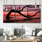 Three-panel canvas wall art featuring sunset beach photography, displayed in a modern living room above seating.