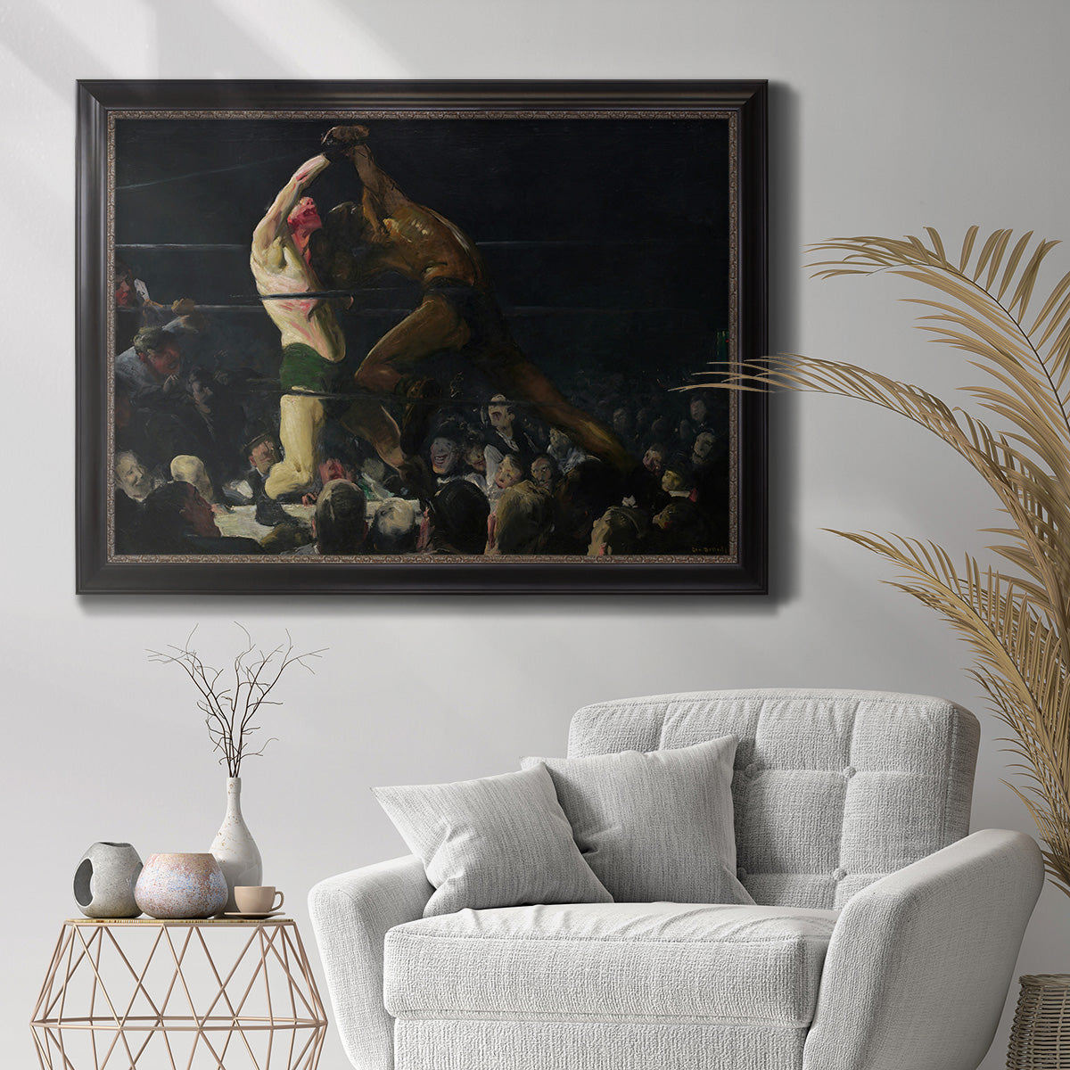 American genre painting of men in a social club by George Bellows in an ornate black frame with gilded inner detail displayed in a bright interior setting.