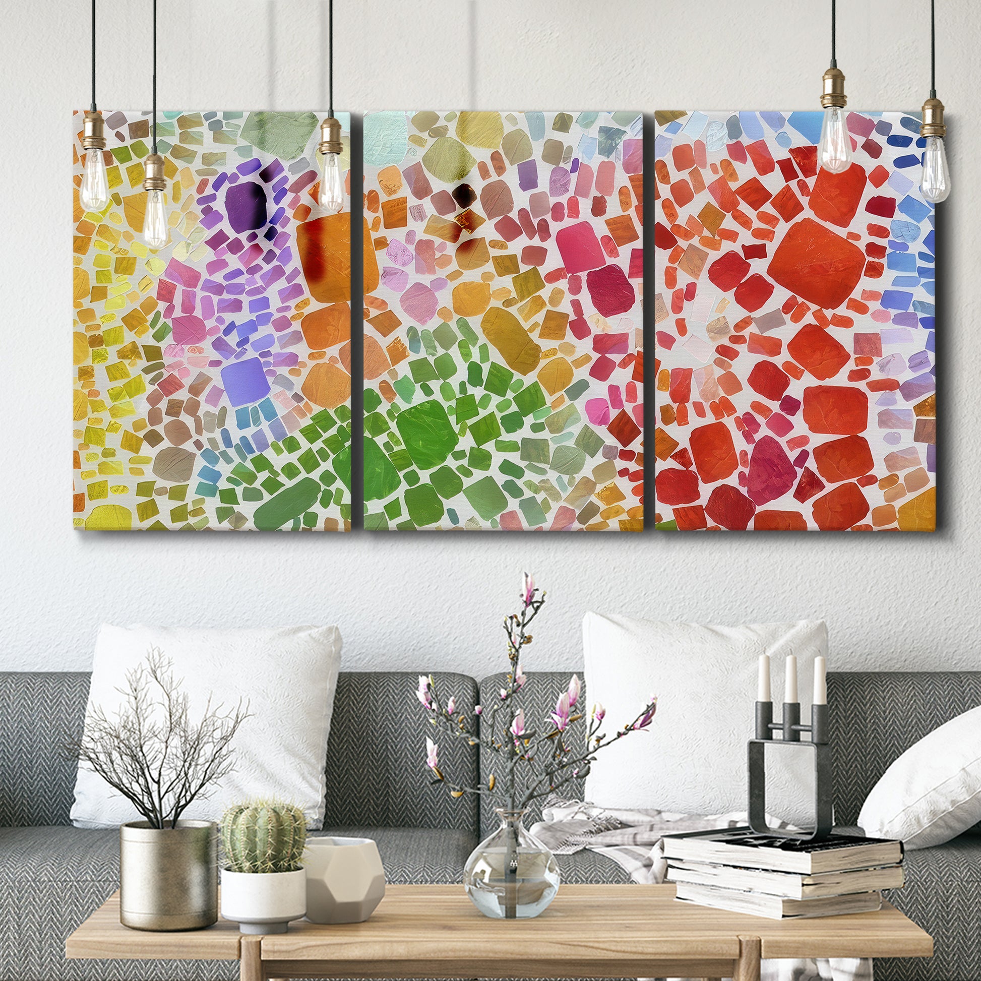 Three-panel canvas wall art featuring peaceful tropical inspired landscape, displayed in a modern living room above seating.
