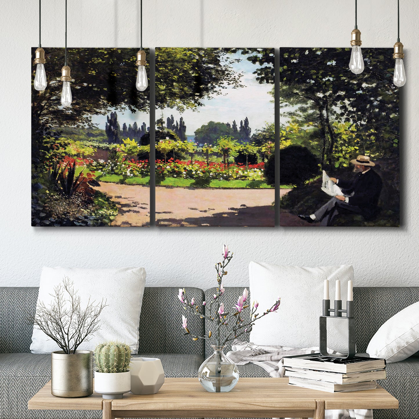 Three-panel canvas wall art featuring coastal garden overlooking sea, displayed in a modern living room above seating.