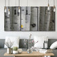 Three-panel canvas wall art featuring close up tree bark texture photograph, displayed in a modern living room above seating.