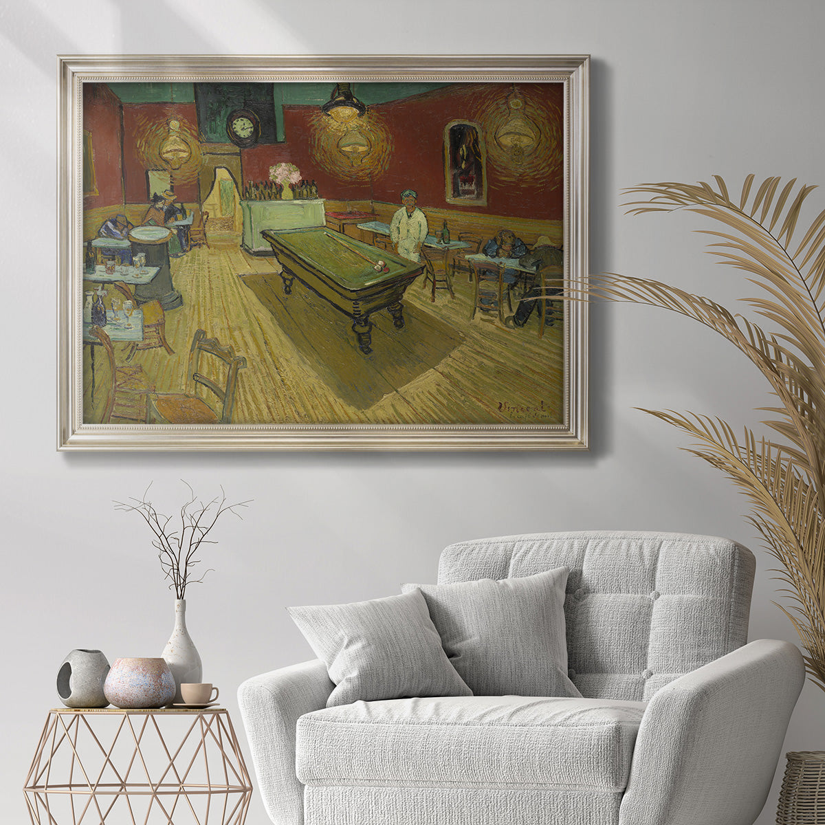 Impressionist interior of a night café by Vincent van Gogh in an ornate champagne frame displayed in a bright interior setting.