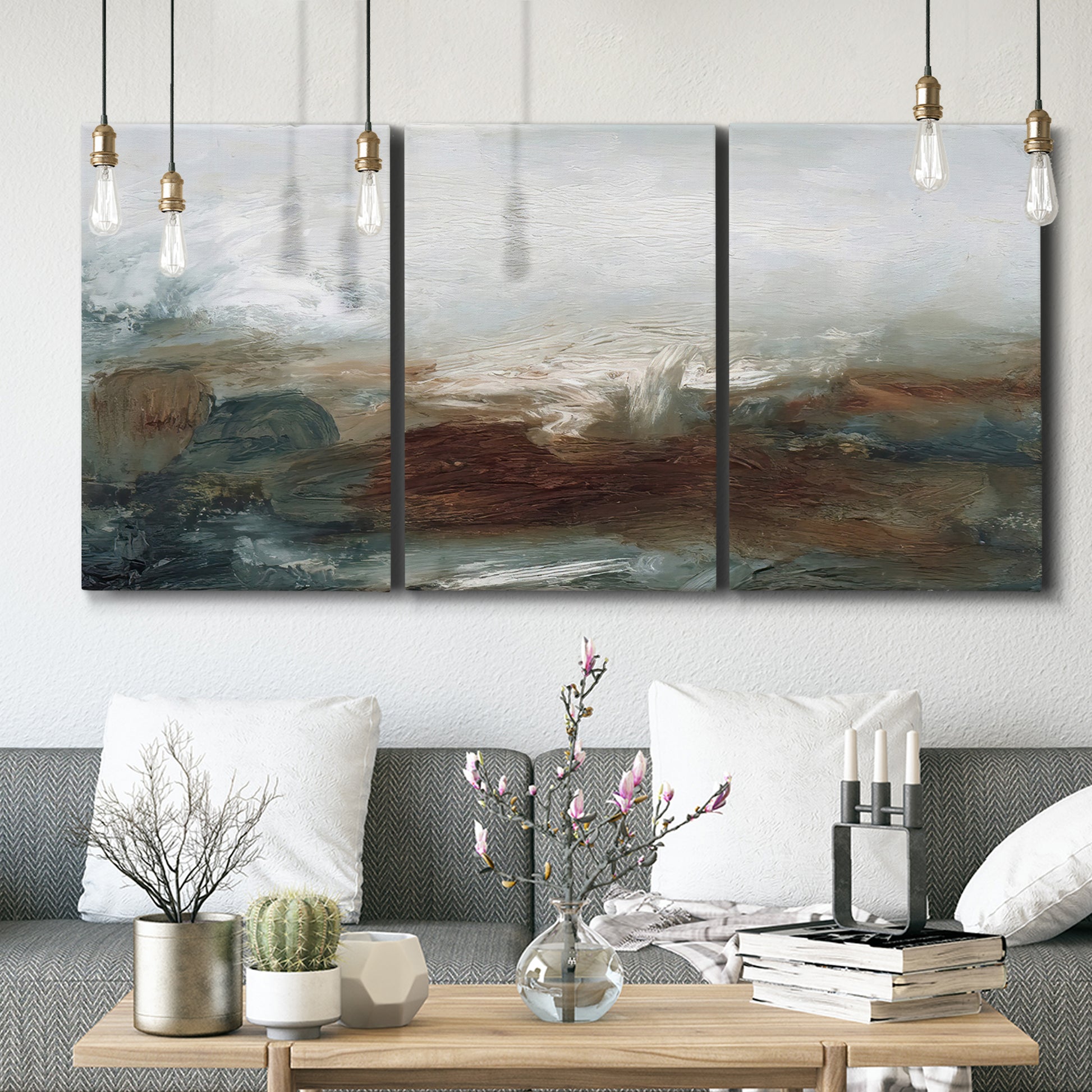 Three-panel canvas wall art featuring soft abstract evening light, displayed in a modern living room above seating.