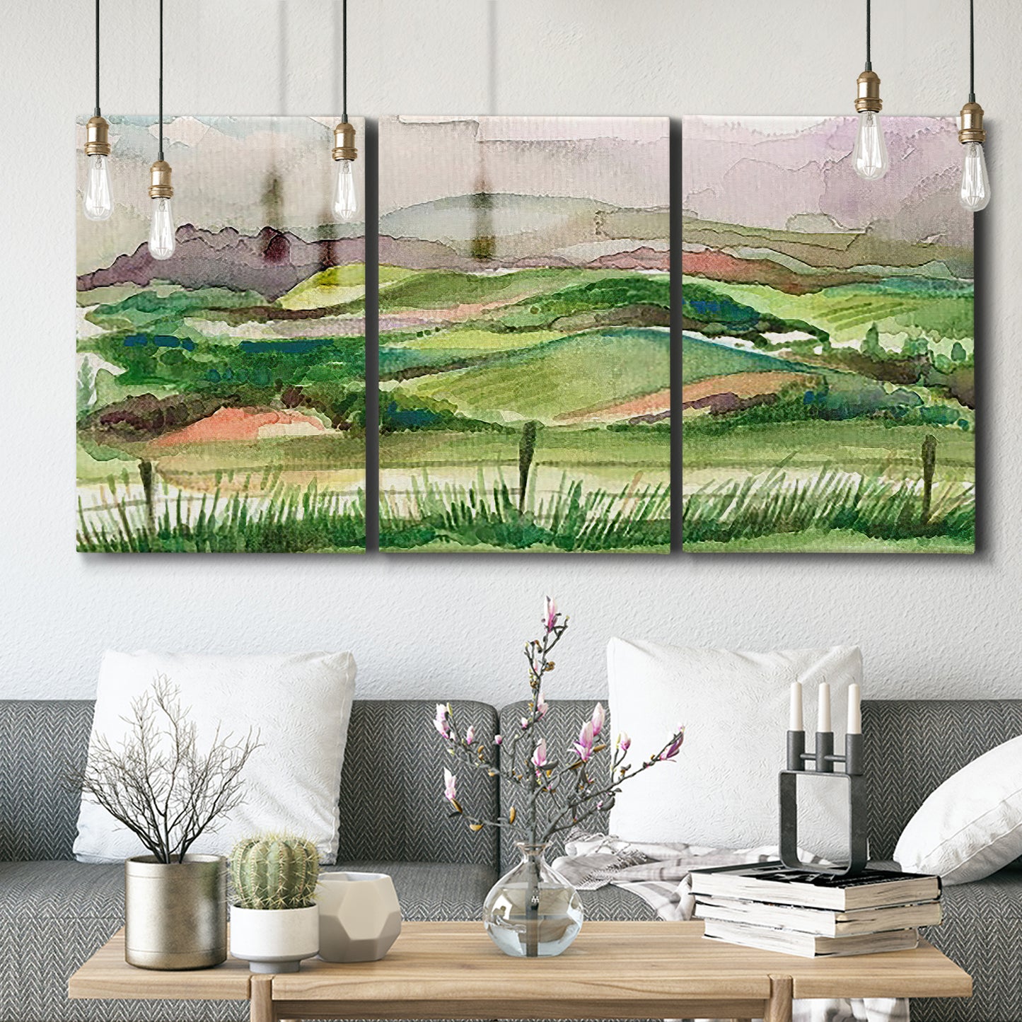 Three-panel canvas wall art featuring rainy landscape with soft atmosphere, displayed in a modern living room above seating.