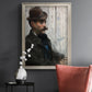 Impressionist portrait of a seated man by Édouard Manet in an ornate champagne frame displayed in a dark-toned interior setting.