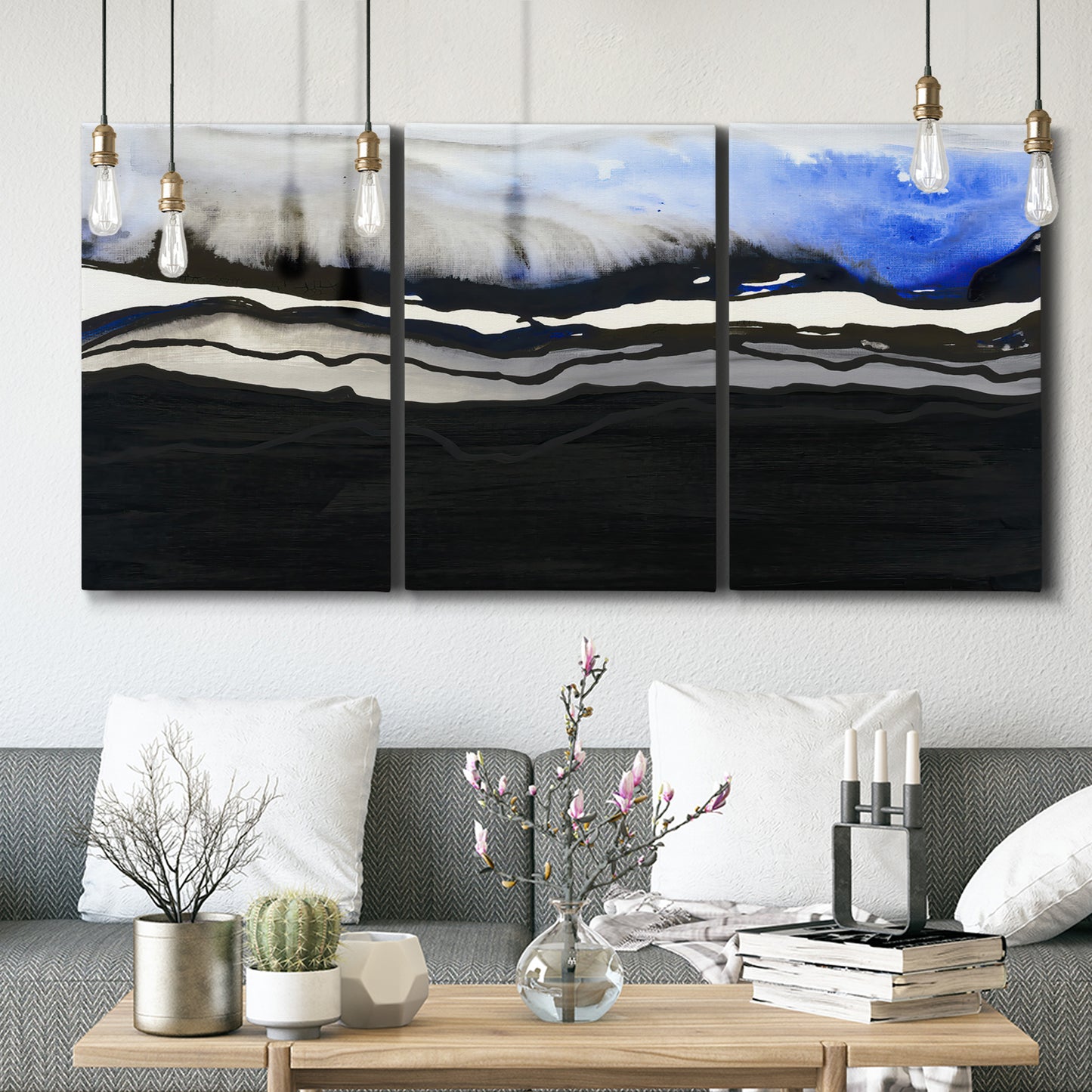 Three-panel canvas wall art featuring abstract passage of time composition, displayed in a modern living room above seating.