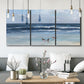 Three-panel canvas wall art featuring loose farmhouse style floral painting, displayed in a modern living room above seating.