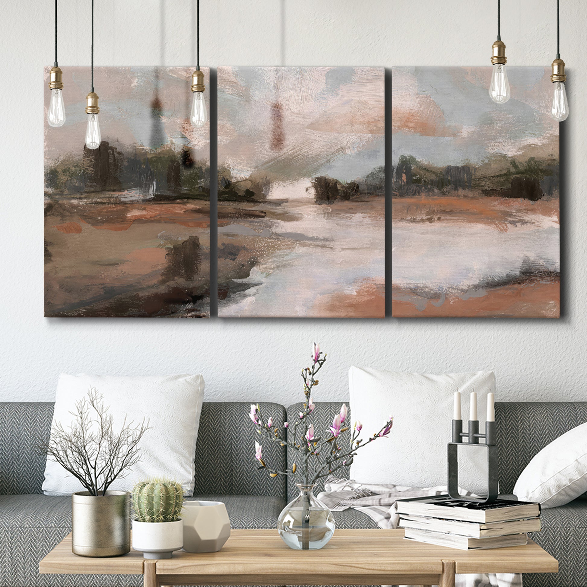 Three-panel canvas wall art featuring quiet pond with soft reflections, displayed in a modern living room above seating.