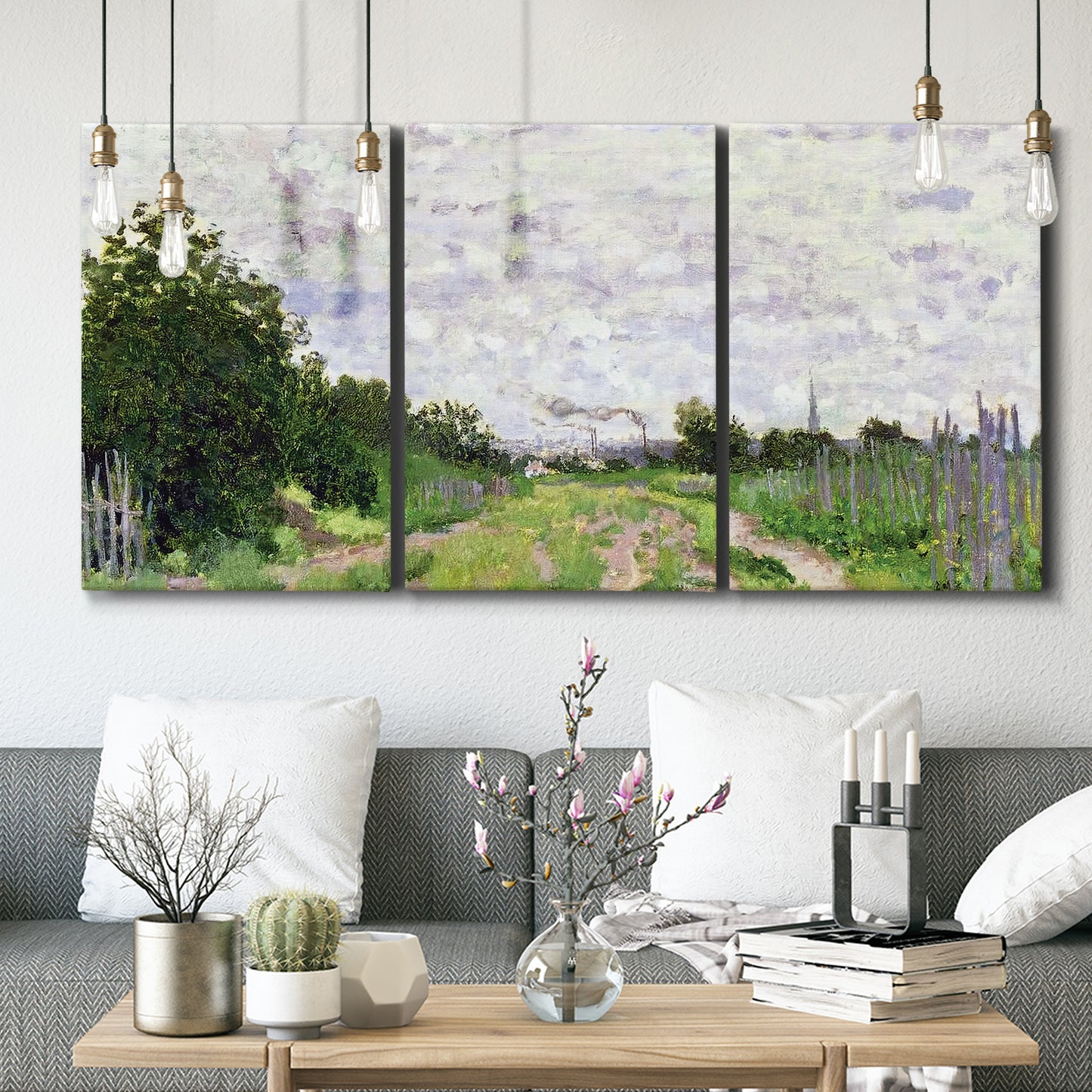 Three-panel canvas wall art featuring spring landscape with blossoming trees, displayed in a modern living room above seating.