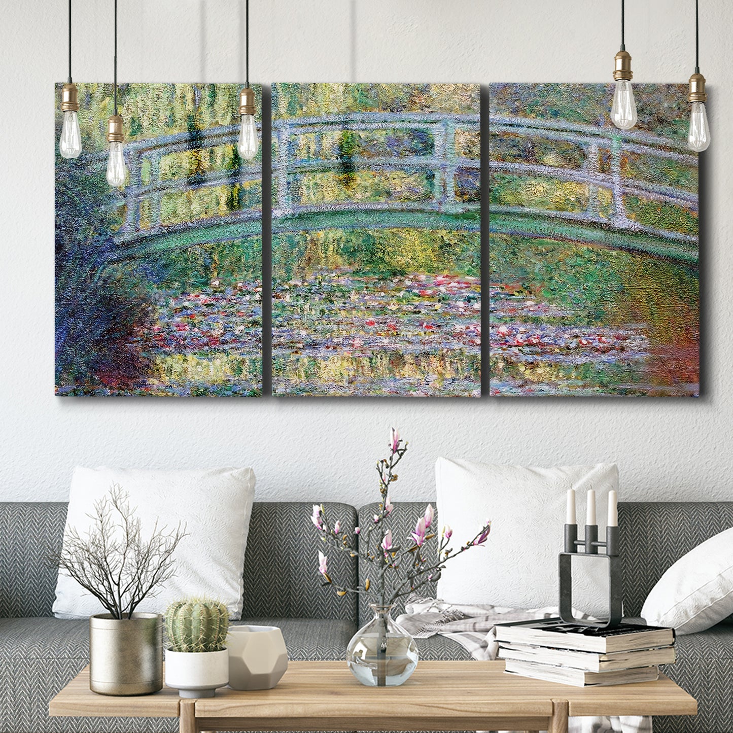 Three-panel canvas wall art featuring water lilies with arched bridge, displayed in a modern living room above seating.