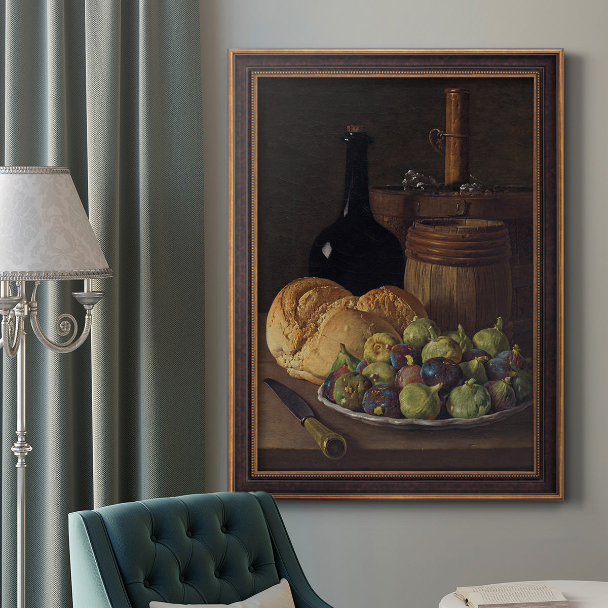 Realist still life with figs and bread by Luis Meléndez in an ornate bronzed mahogany wood frame displayed in a dark-toned interior setting.