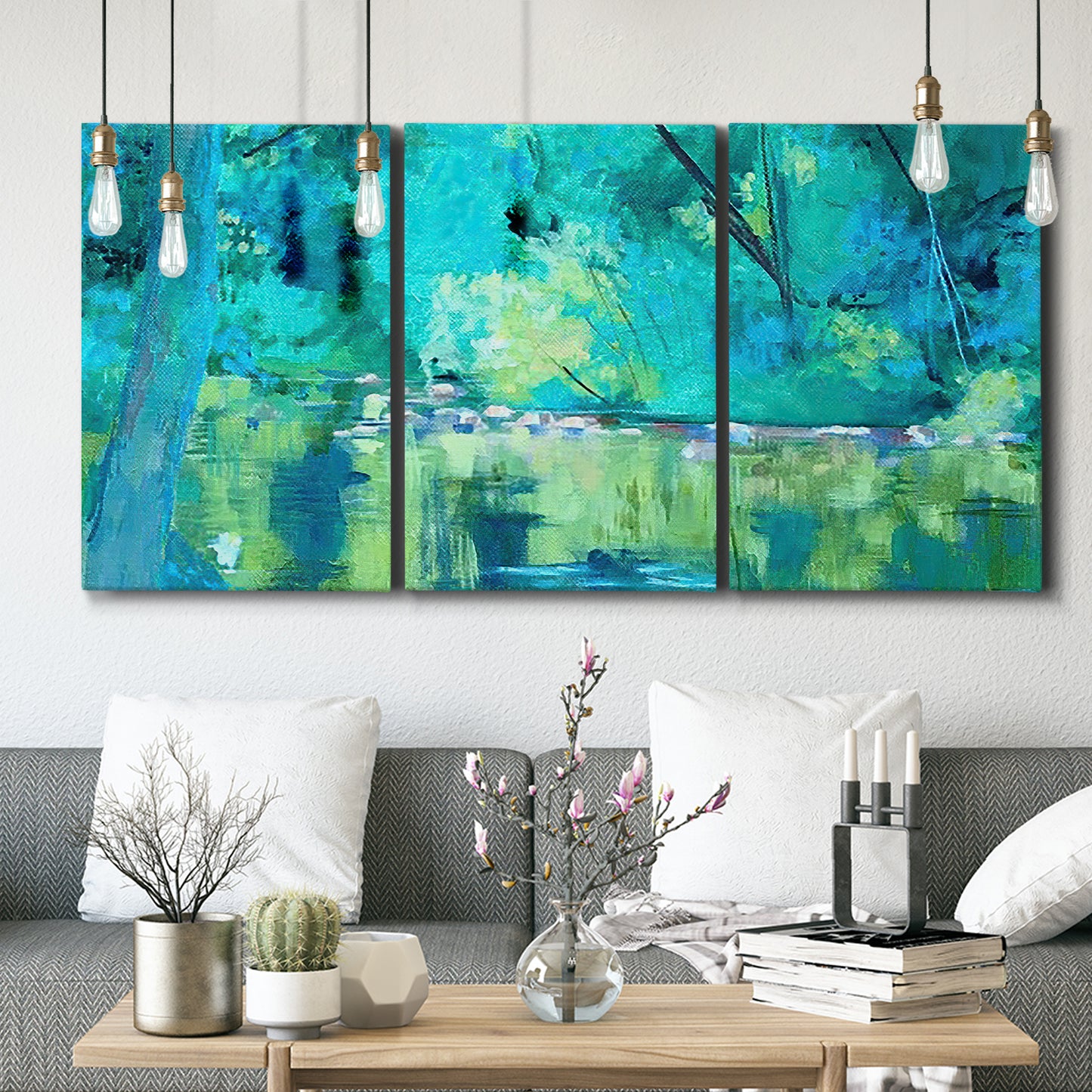 Three-panel canvas wall art featuring abstract river composition with movement, displayed in a modern living room above seating.