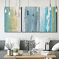Three-panel canvas wall art featuring abstract coastal shoreline textures, displayed in a modern living room above seating.