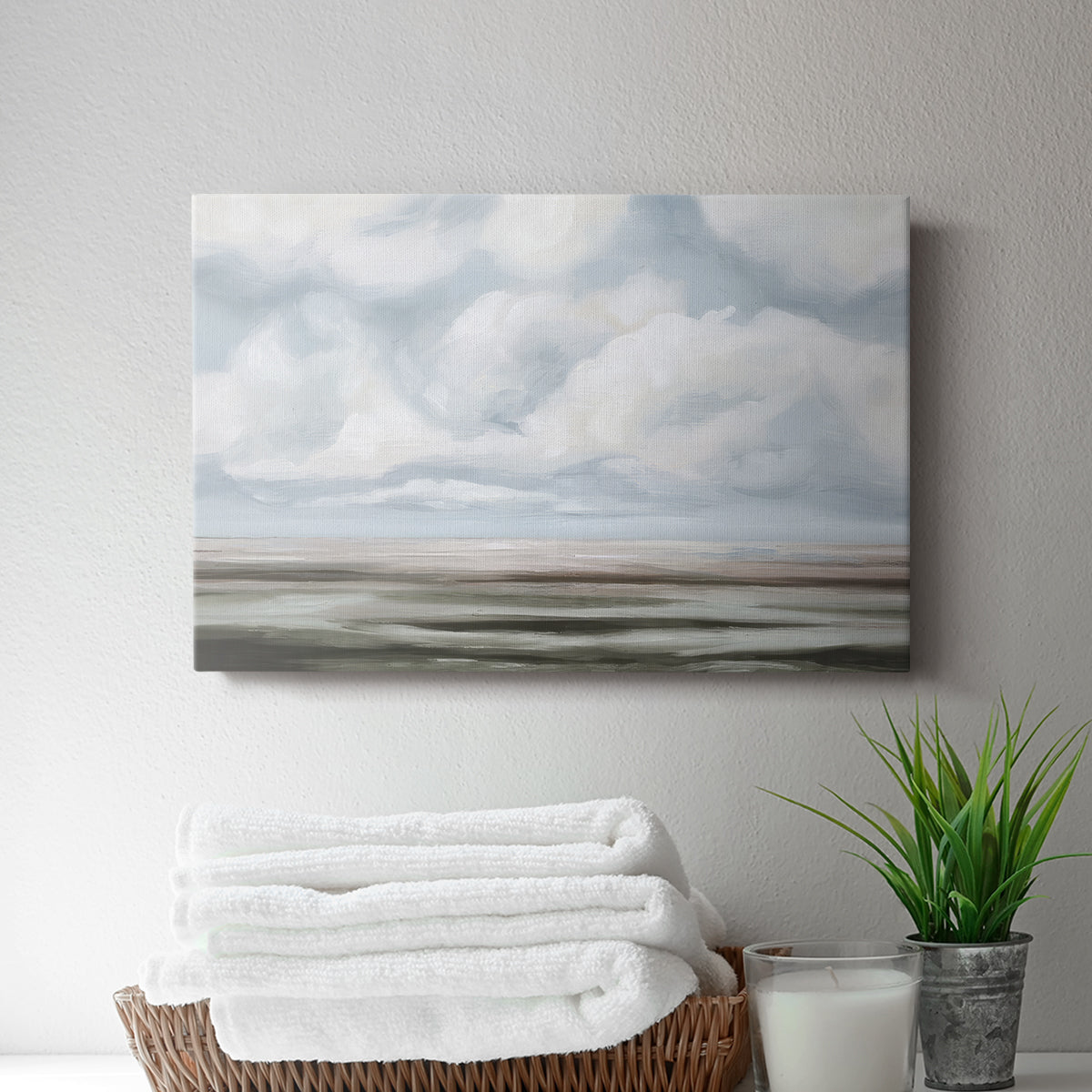 Cloudy sky above calm waters with distant horizon during daylight