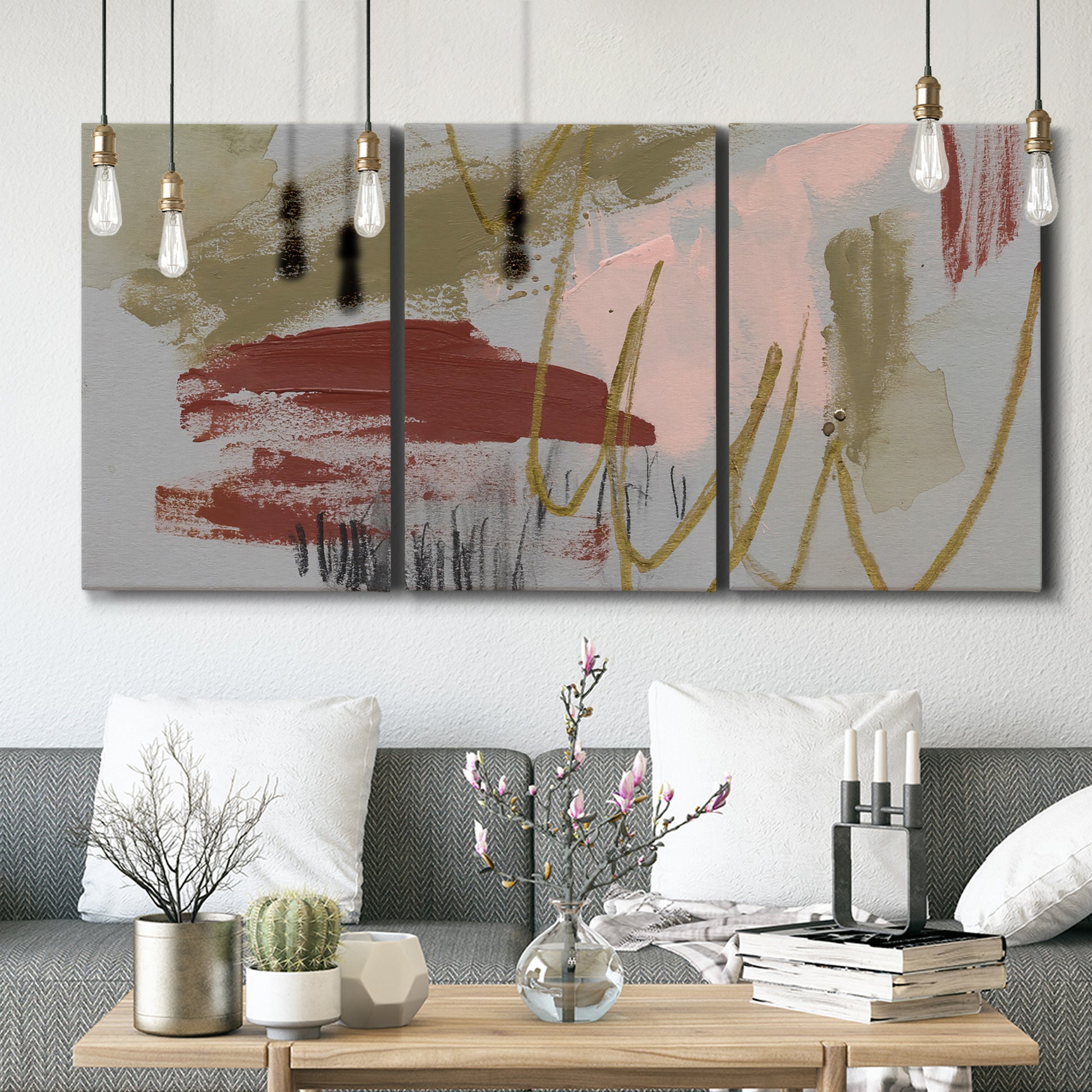 Three-panel canvas wall art featuring minimalist abstract line textures, displayed in a modern living room above seating.