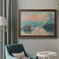 Impressionist winter river sunset scene by Claude Monet in an ornate bronzed mahogany wood frame displayed in a bright interior setting.