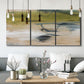 Three-panel canvas wall art featuring minimal abstract water reflections, displayed in a modern living room above seating.