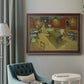 Impressionist interior of a night café by Vincent van Gogh in an ornate bronzed mahogany wood frame displayed in a bright interior setting.