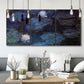 Three-panel canvas wall art featuring deep blue water lily reflections, displayed in a modern living room above seating.