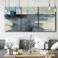 Three-panel canvas wall art featuring abstract watercolor with upward motion, displayed in a modern living room above seating.