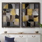 Set of two black barnwood framed canvas prints depicting a coordinated art pair of interlocking black gray cream and gold geometric sections rendered as structured modern abstracts above a dining room sideboard.