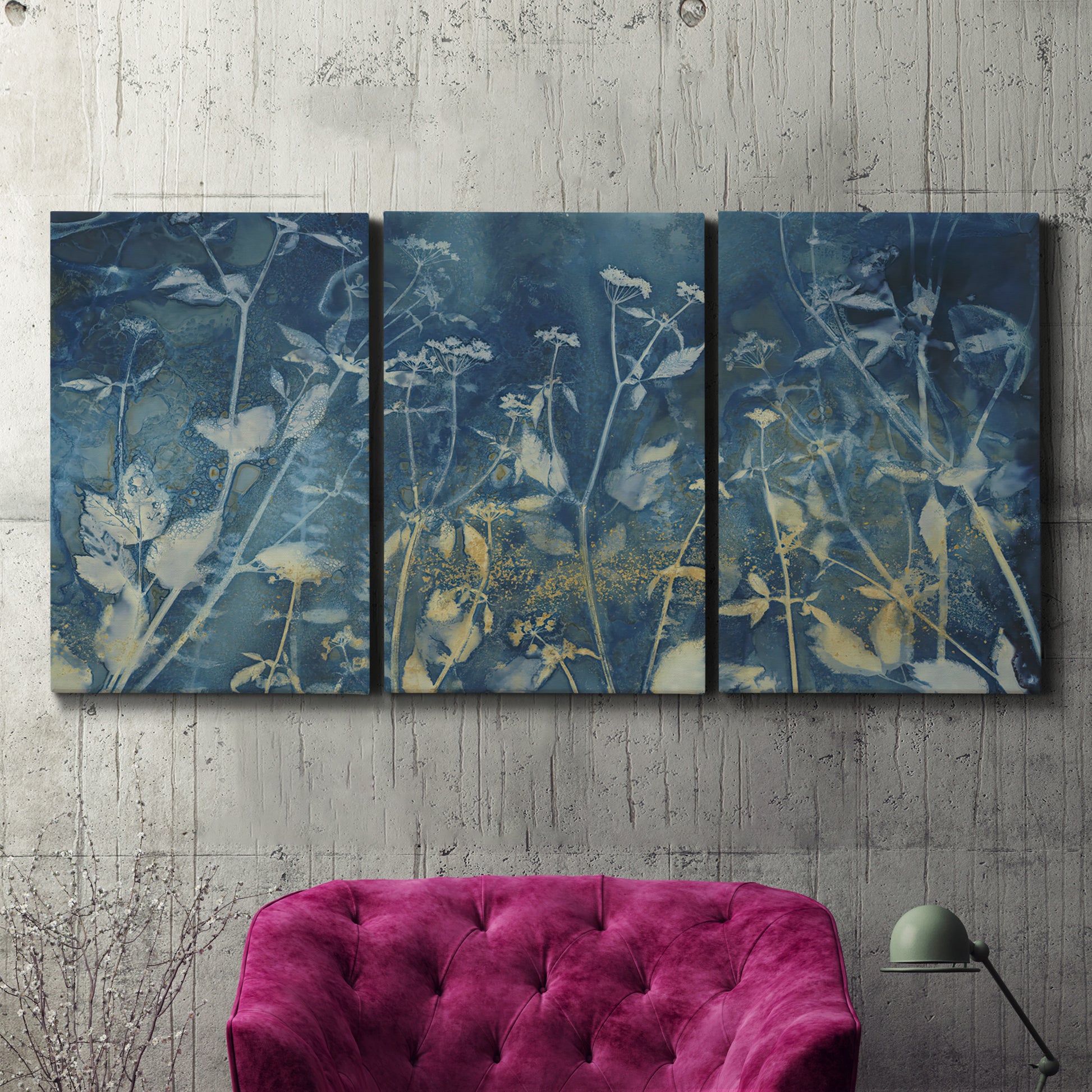 Three-panel canvas wall art featuring dark abstract with rich tonal depth, displayed in a living room above a suede accent chair.