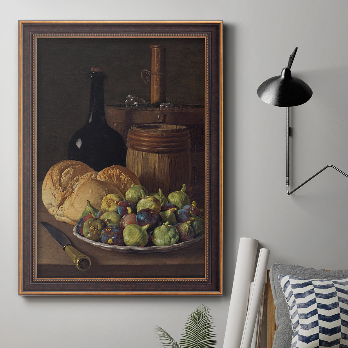 Realist still life with figs and bread by Luis Meléndez in an ornate bronzed mahogany wood frame displayed in a neutral interior setting.
