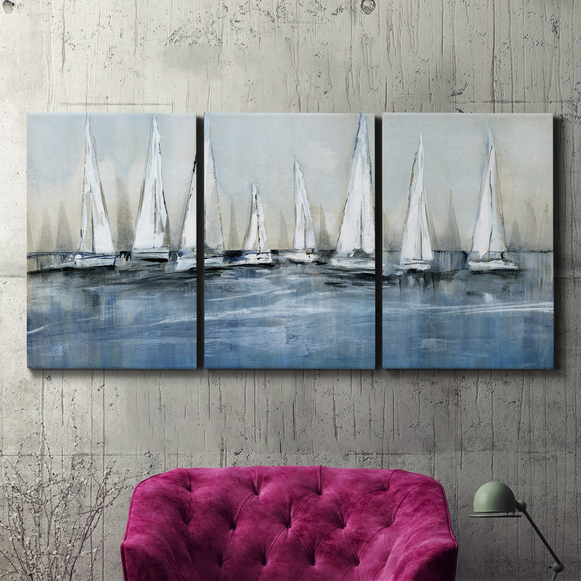 Three-panel canvas wall art featuring still life with pears and grapes, displayed in a living room above a suede accent chair.