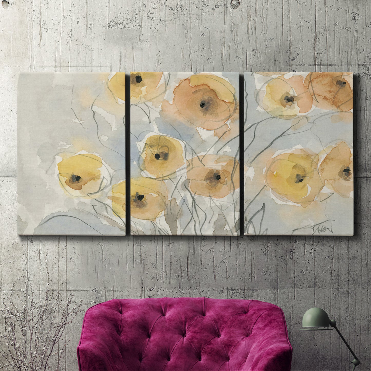 Three-panel canvas wall art featuring minimalist poppies at sunset, displayed in a living room above a suede accent chair.