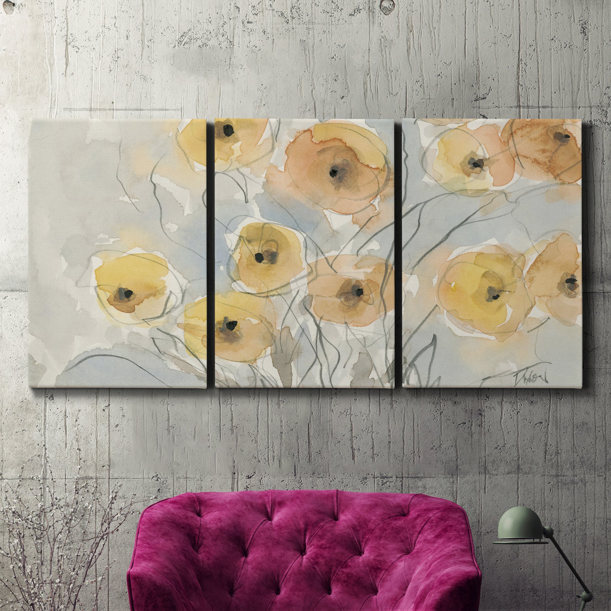 Three-panel canvas wall art featuring minimalist poppies at sunset, displayed in a living room above a suede accent chair.
