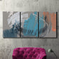 Three-panel canvas wall art featuring playful abstract mark making, displayed in a living room above a suede accent chair.