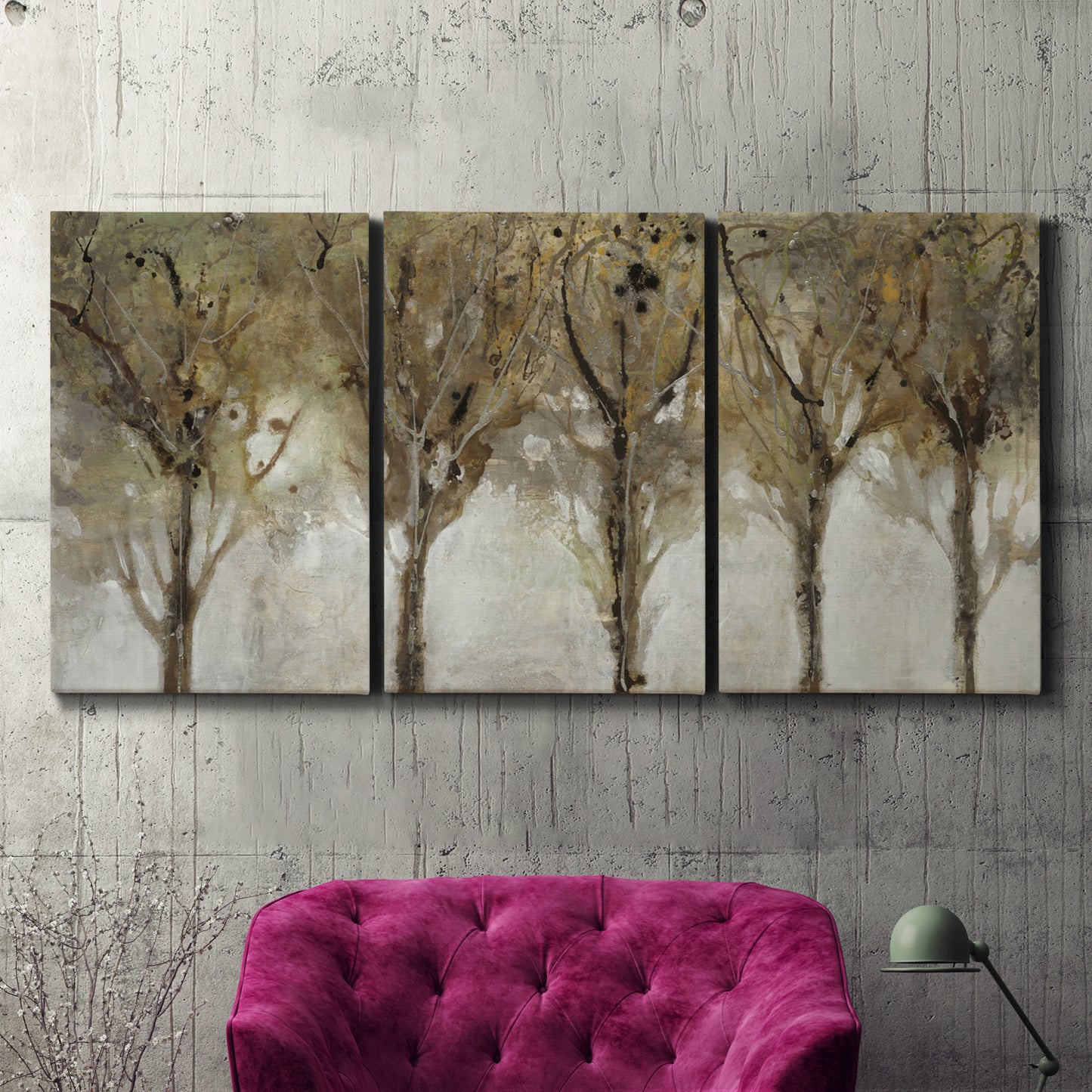 Three-panel canvas wall art featuring sunlight filtering through trees, displayed in a living room above a suede accent chair.