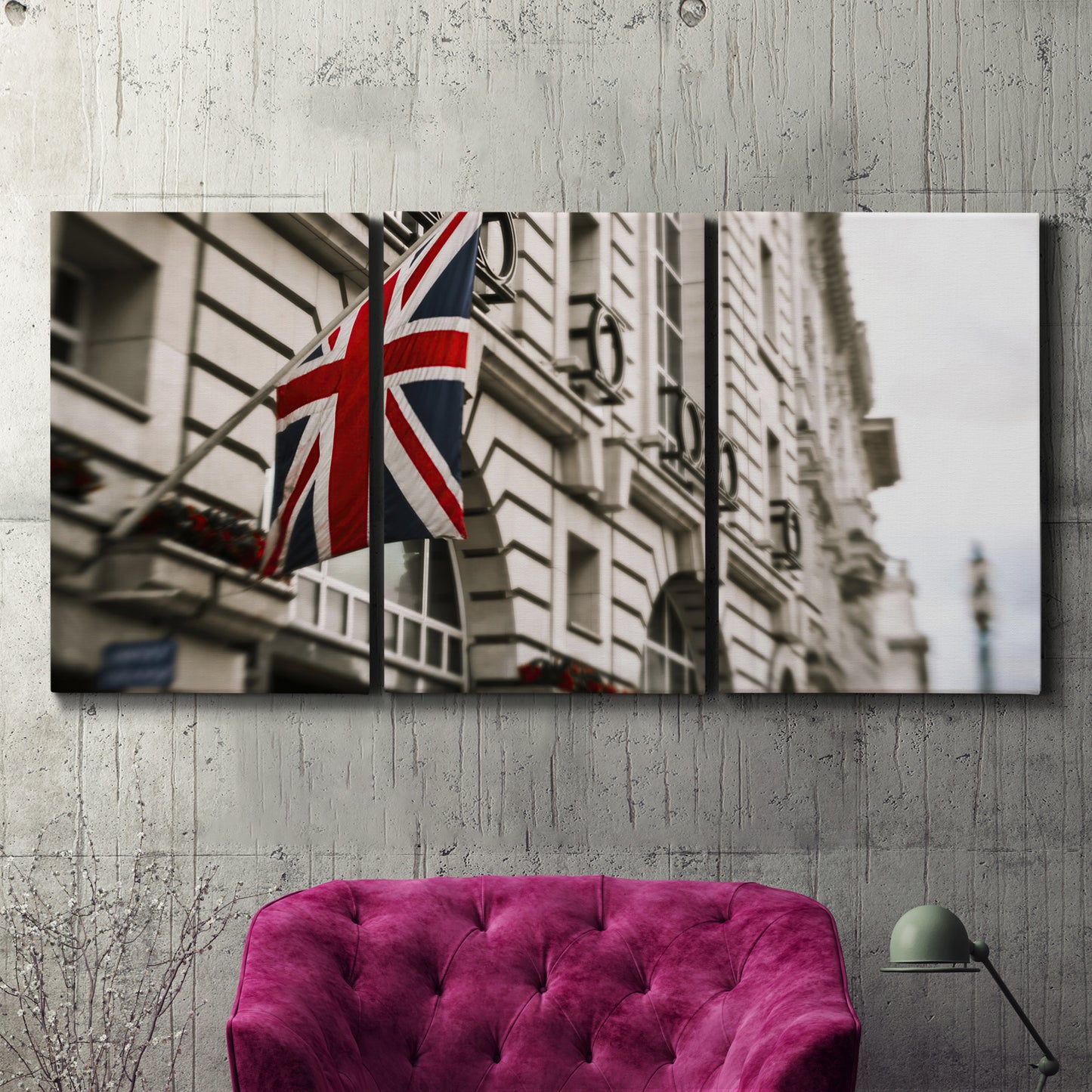 Three-panel canvas wall art featuring london street scene photograph, displayed in a living room above a suede accent chair.