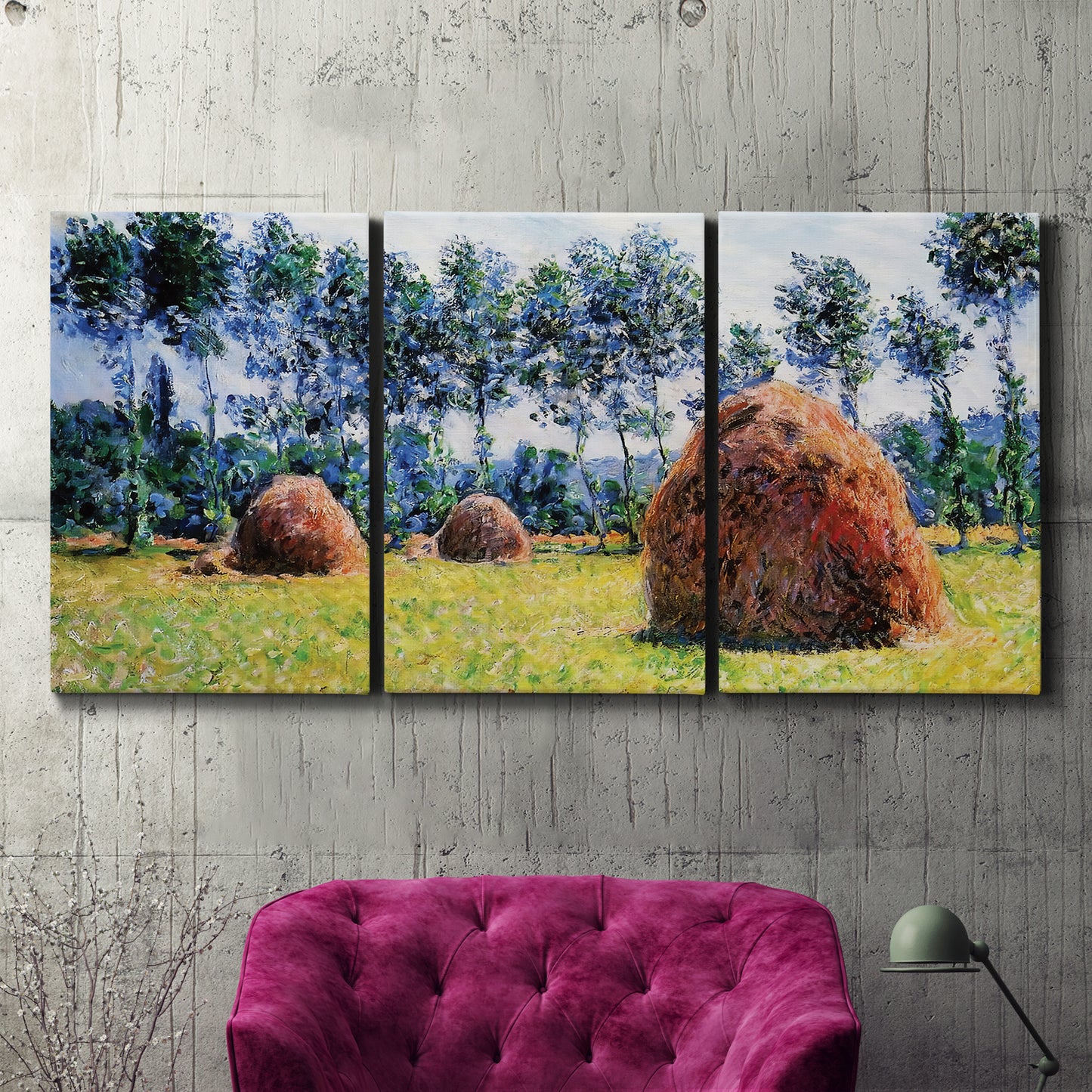 Three-panel canvas wall art featuring harvested grainstacks in field, displayed in a living room above a suede accent chair.