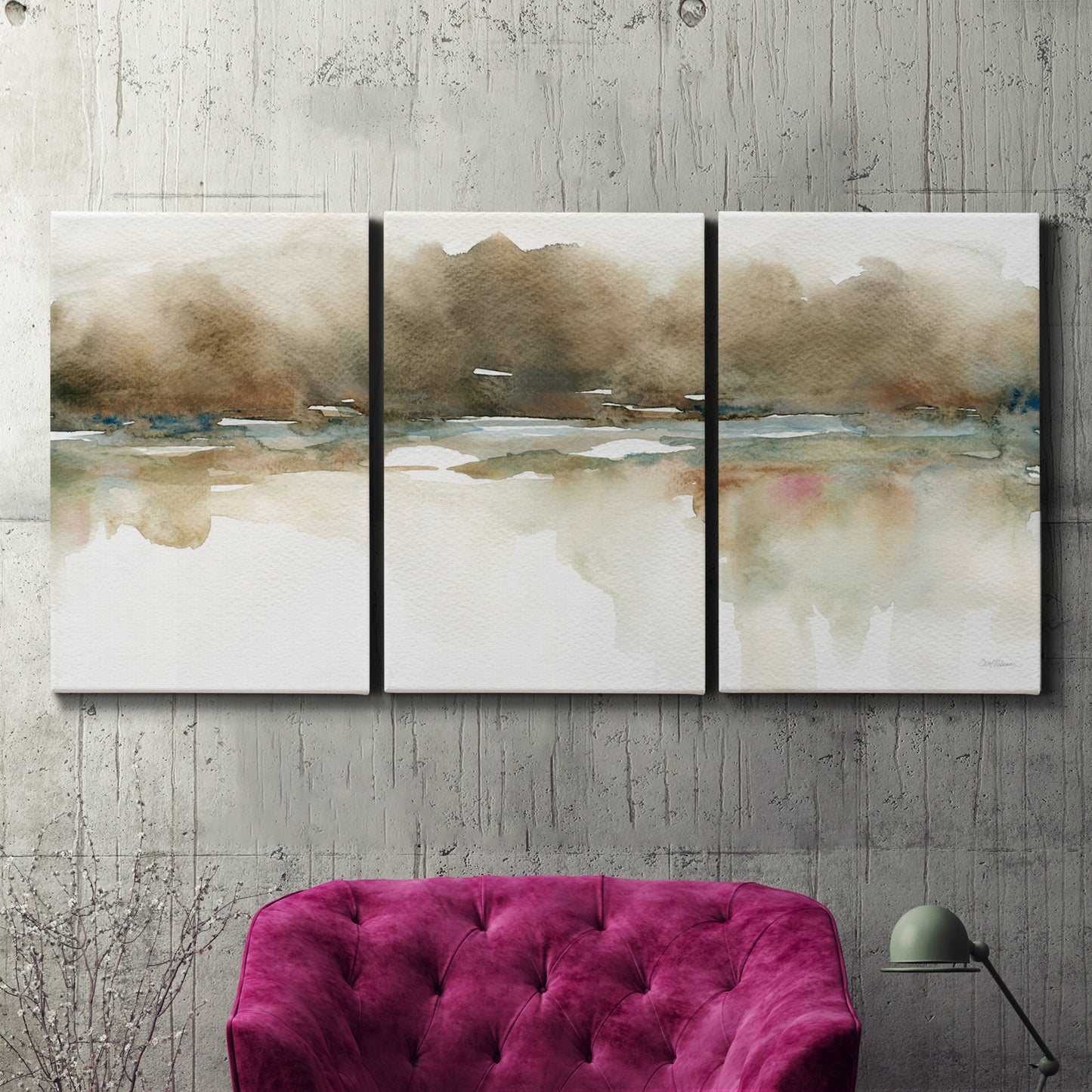 Three-panel canvas wall art featuring soft abstract mirrored reflections, displayed in a living room above a suede accent chair.