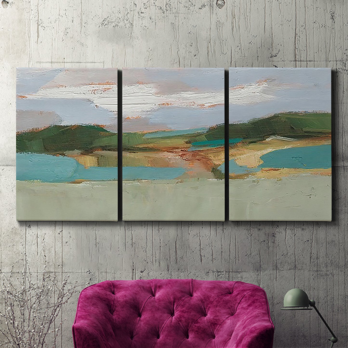 Three-panel canvas wall art featuring wide open landscape under midday light, displayed in a living room above a suede accent chair.