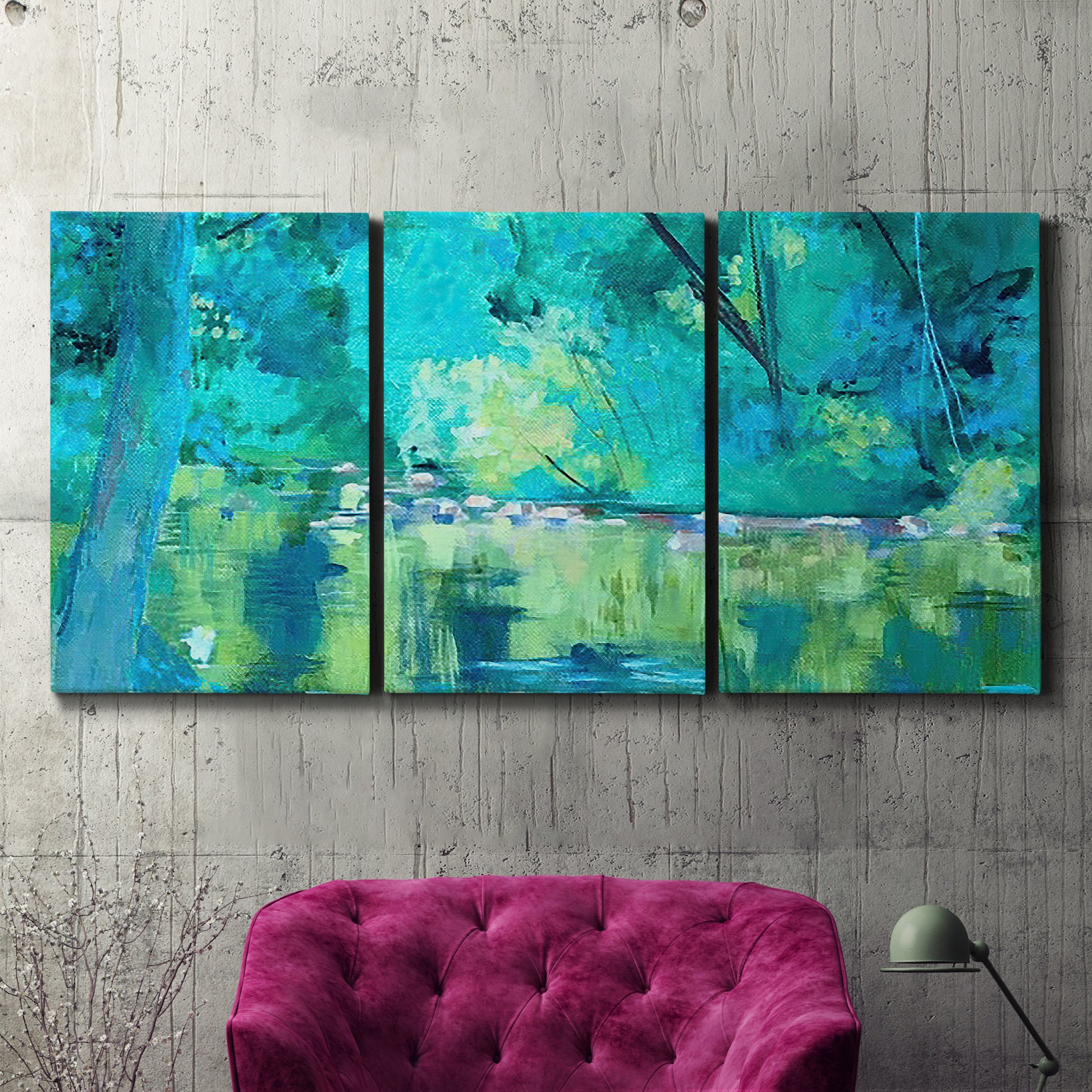 Three-panel canvas wall art featuring abstract river composition with movement, displayed in a living room above a suede accent chair.