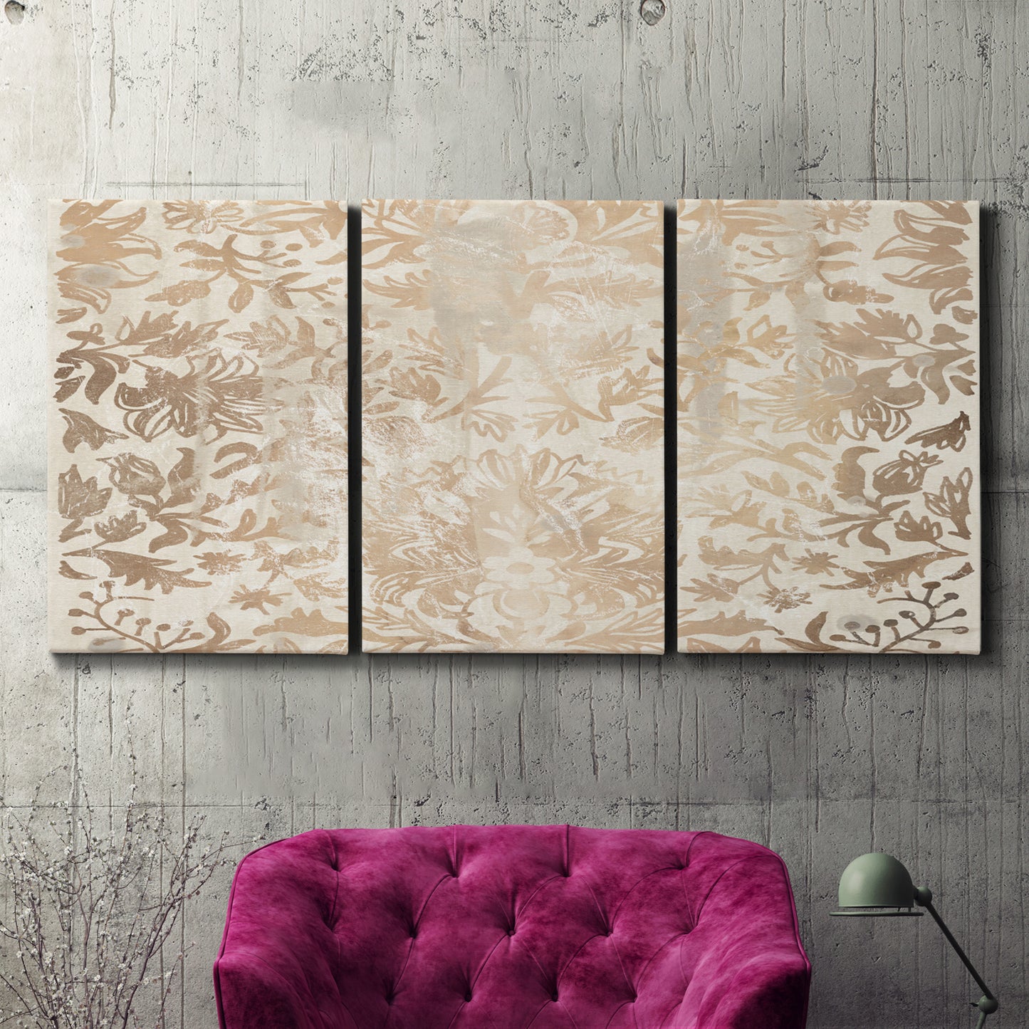 Three-panel canvas wall art featuring ornamental damask abstract pattern, displayed in a living room above a suede accent chair.