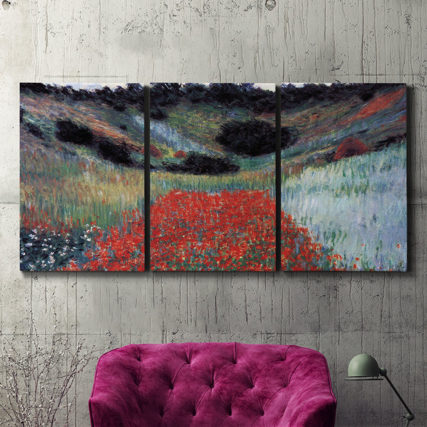 Three-panel canvas wall art featuring poppy field in shallow valley, displayed in a living room above a suede accent chair.