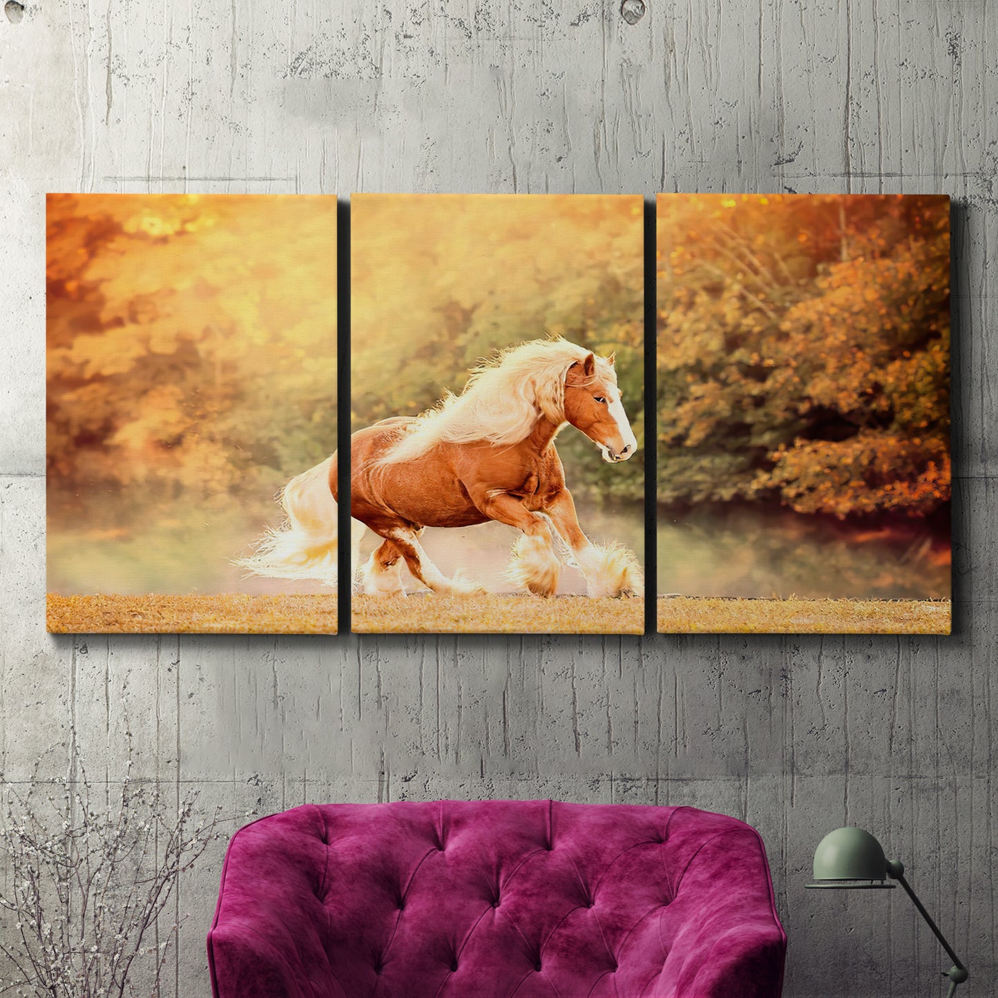 Three-panel canvas wall art featuring running horses captured in motion, displayed in a living room above a suede accent chair.