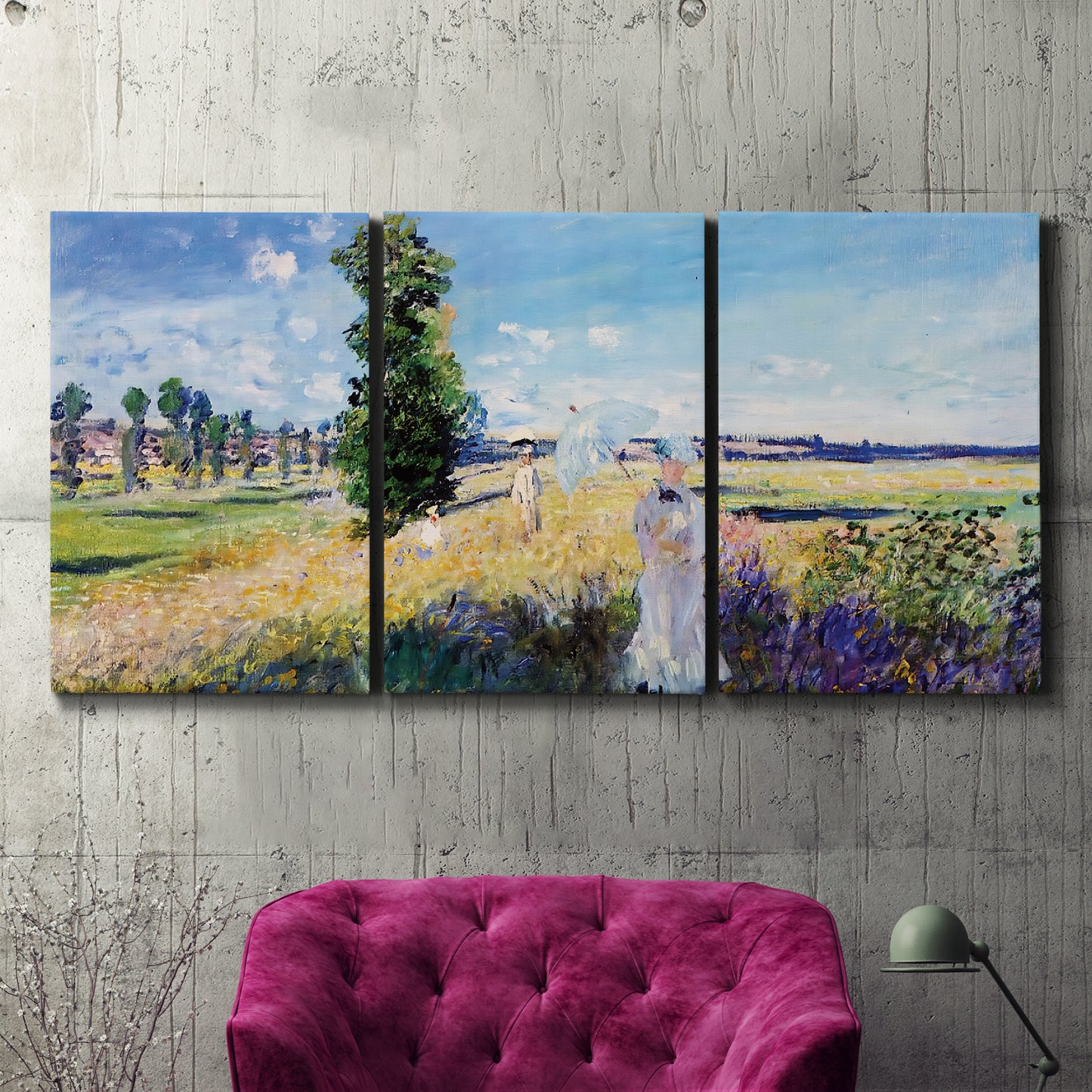 Three-panel canvas wall art featuring riverside path with figures, displayed in a living room above a suede accent chair.