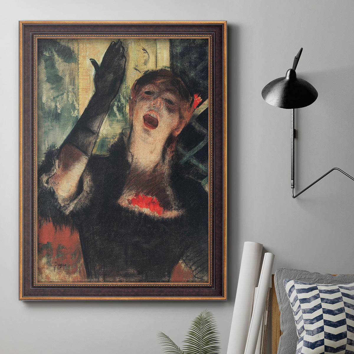 Impressionist portrait of a café singer by Edgar Degas in an ornate bronzed mahogany wood frame displayed in a neutral interior setting.