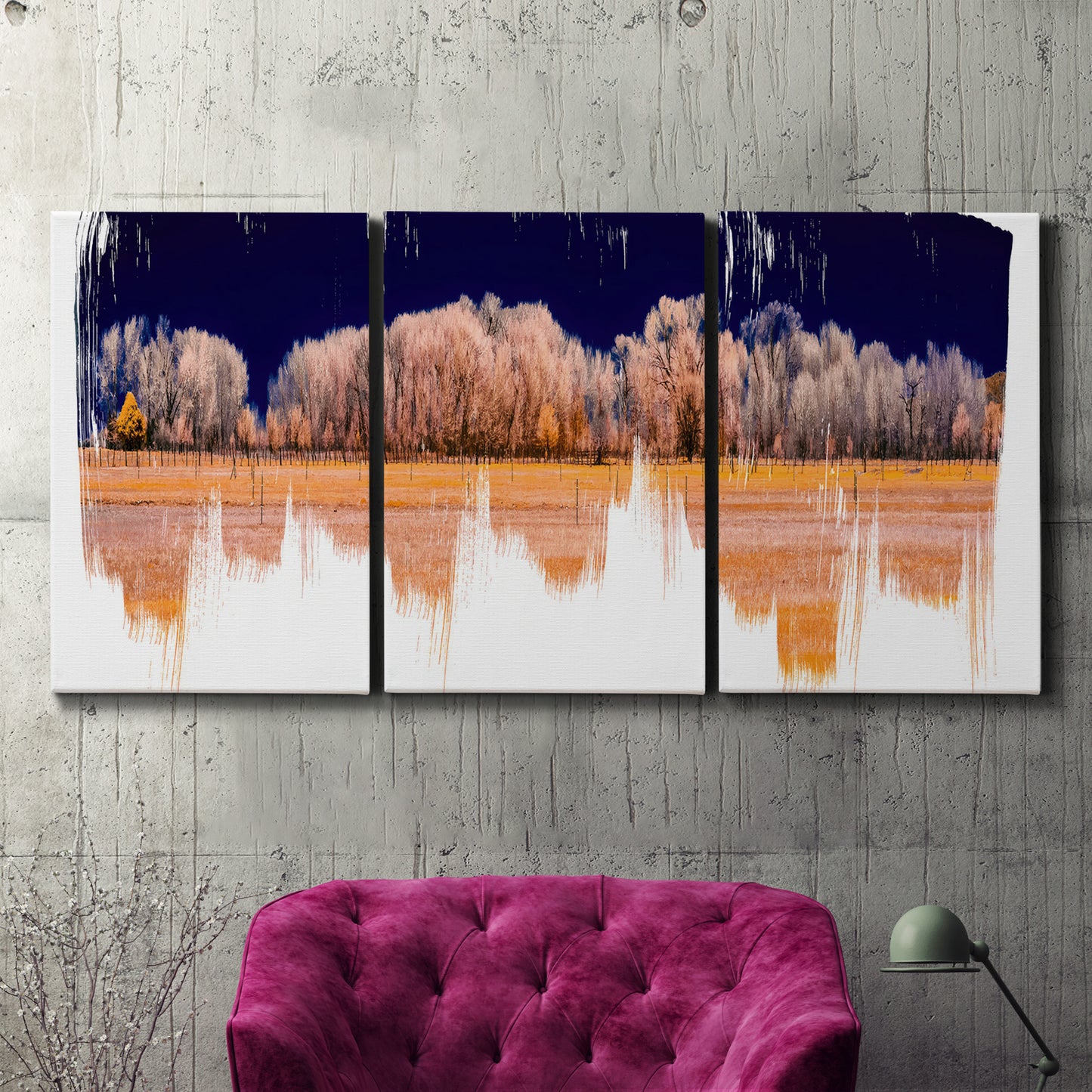 Three-panel canvas wall art featuring panoramic treeline landscape photograph, displayed in a living room above a suede accent chair.