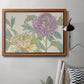 Contemporary peony flower illustration in an ornate vintage burl wood frame displayed in a neutral interior setting.