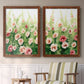 Set of two maple barnwood framed canvas prints depicting two luminous impressionistic floral paintings featuring a field of pink coral and white flowers above a sideboard in a cozy sitting room.